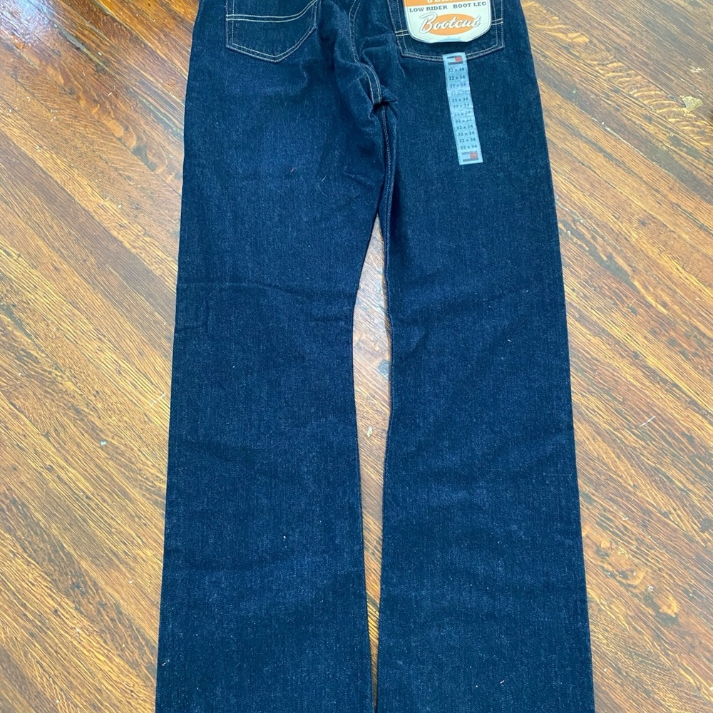 This is Tommy Jeans, with low rider, boot legs, bootcut.